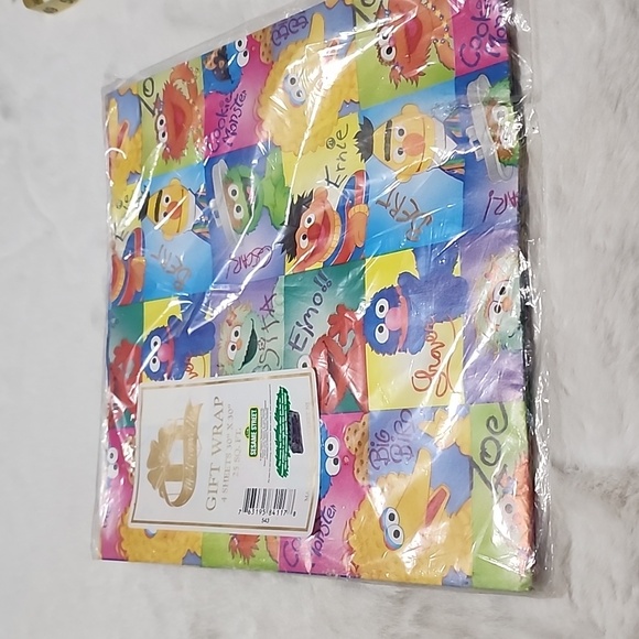 NEW IN PACKAGE.  ALL WRAPPED UP. SESAME STREET  WRAPPING PAPER. - Picture 1 of 4